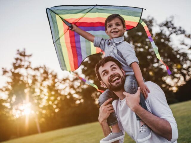 Dad and son with kite